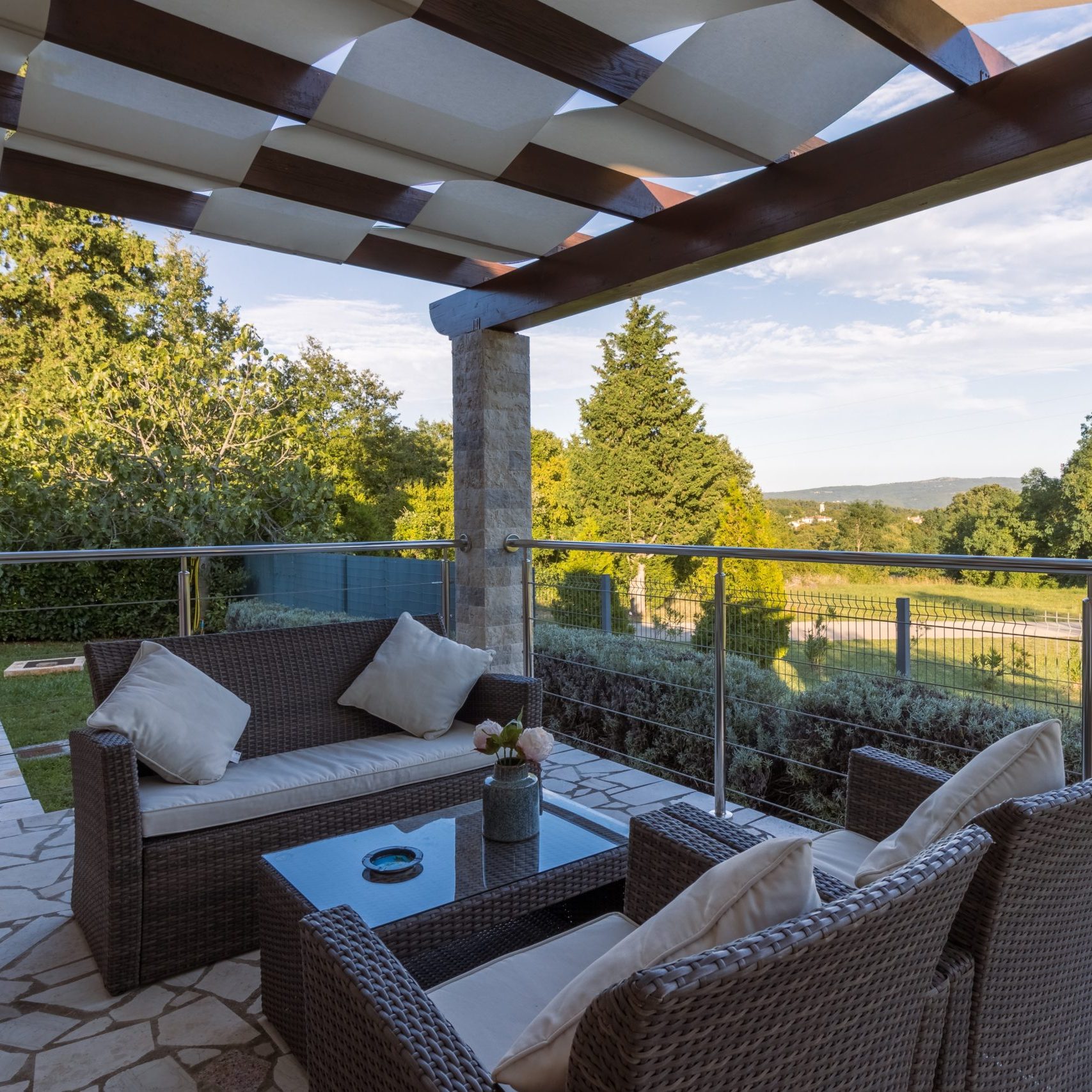 an amazing view in the morning from an outdoor pergola
